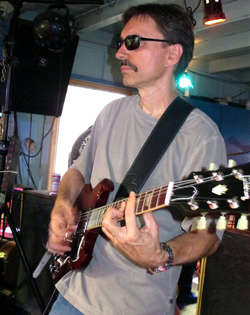 Reiner Gruebel - Lead Vocalist, Rhythm Guitarist